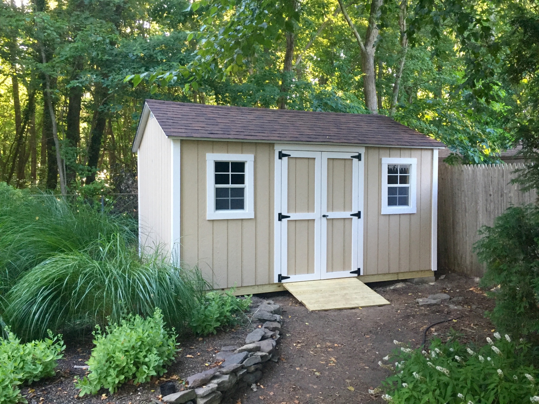 Custom wooden shed built on-site in a Southern Indiana backyard
